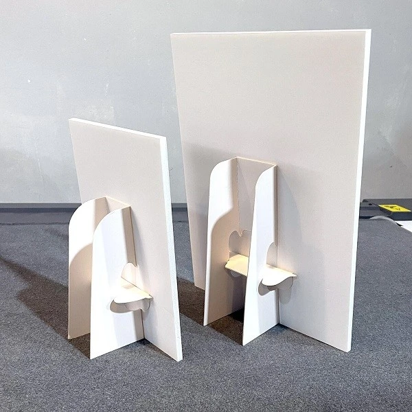 POS PVC foam board counter display components arranged in flat-pack layout showing white die-cut panels with tab-and-slot connectors header card base tray and side supports precision-cut from rigid expanded PVC sheet ready for tool-free retail assembly POS PVC foam board counter display components arranged in flat-pack layout showing white die-cut panels with tab-and-slot connectors header card base tray and side supports precision-cut from rigid expanded PVC sheet ready for tool-free retail assembly