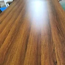 Wood grain PVC foam board sheet with laminated printed wood pattern surface showing smooth durable finish Wood grain PVC foam board sheet with laminated printed wood pattern surface showing smooth durable finish